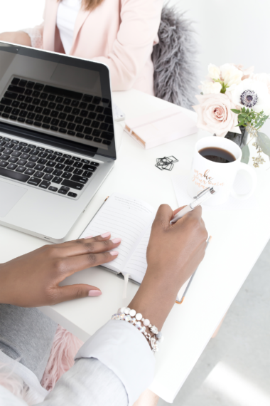 Two Women Working Together at a Desk